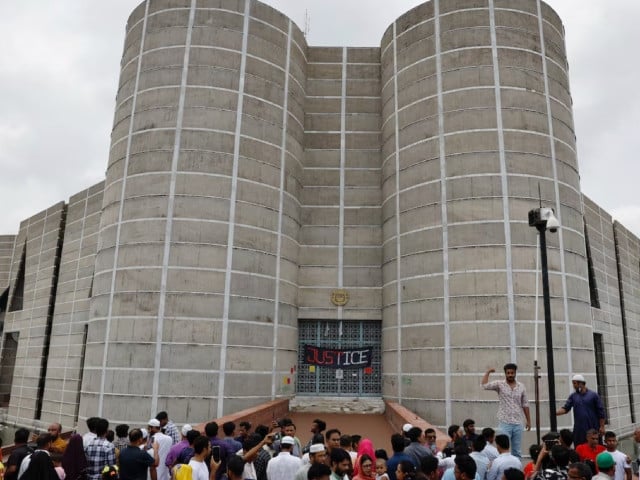 people gather outside the parliament building a day after the resignation of bangladeshi prime minister sheikh hasina in dhaka bangladesh august 6 2024 photo reuters